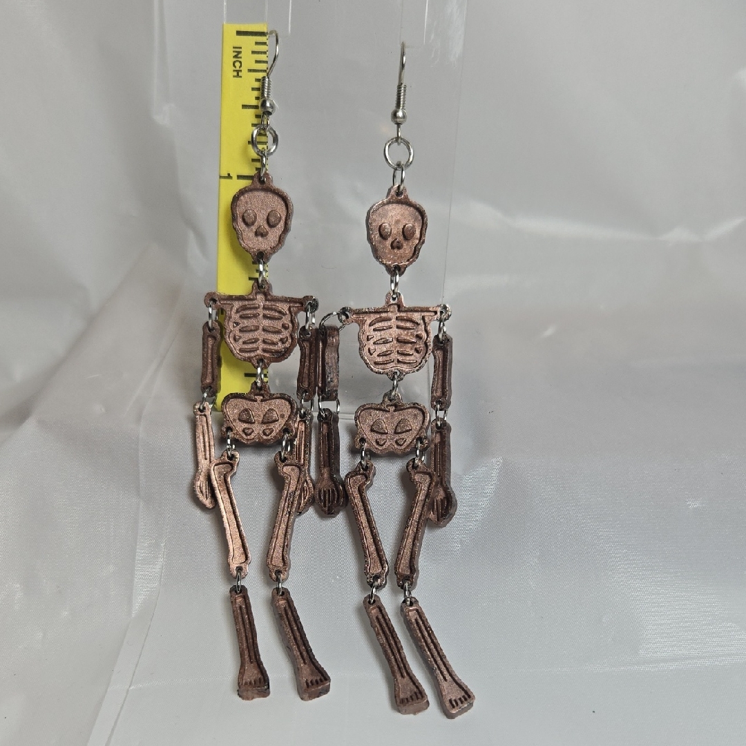 #276- Skeleton Dangle Earrings In Copper And Silver